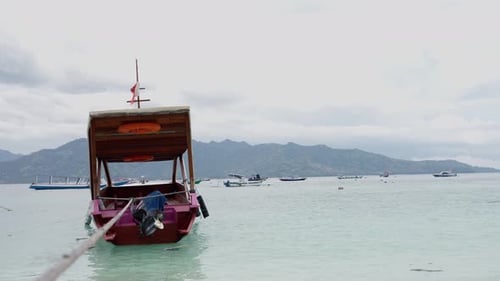 A Fishing Boat on the Ocean a Beautiful Landscape a Red Boat on the Waves