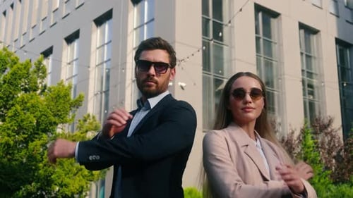 Stylish Business Team Posing Confidently in City