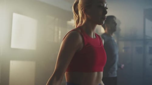 Woman Jumping Rope Exercising in Gym