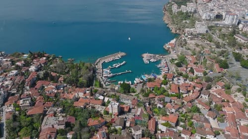High Angle View of Marina and Houses in Urban Borough Tilt Up Reveal Panoramic View of Coast with