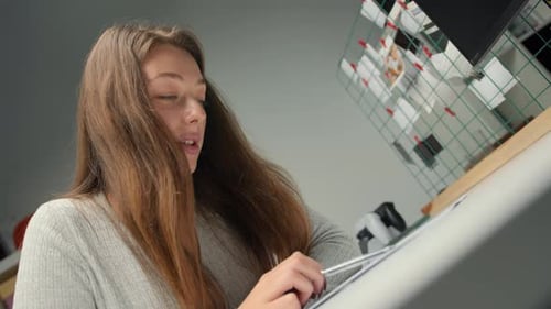 Close-up: woman lawyer office worker proofreading a contract before signing