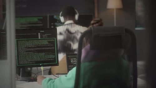 Female Programmer Working on Computer in IT Company Office