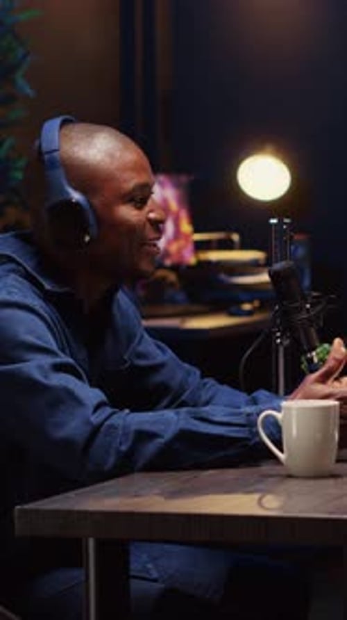 Vertical Video Influencer Unboxing Tech Product for Review Recording Podcast with Guest in Studio