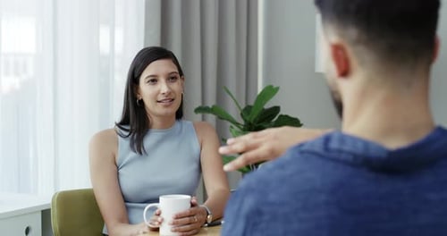 Smiling Woman Talking While Holding Mug