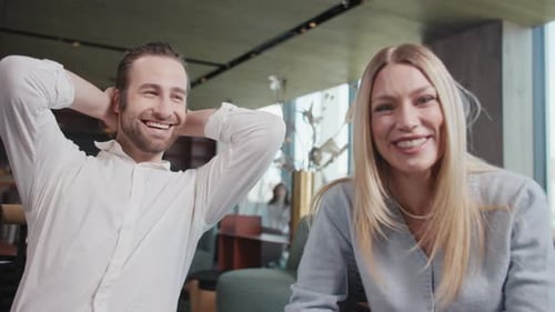 Smiling Family Couples Talking on Video Waving Their Hands From Cafe Chatting Online By Web Camera