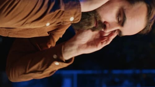 Smiling Developer Listening Music While Doing Programming Close Up