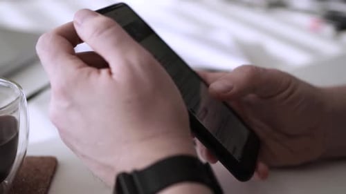 Man scrolling social media in smartphone