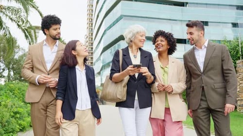 Business Multiethnic People Financial Business People Walking and Talking By Office Building