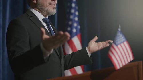 Man Gives Political Speech at Podium