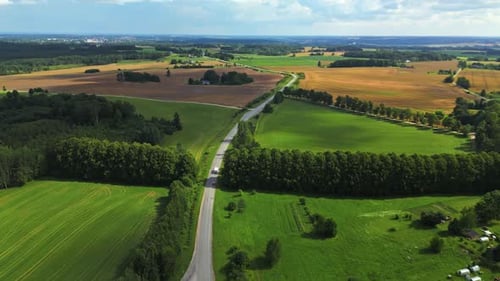 A Stunning Aerial View of Lush Green Fields and Open Roads Set in a Beautiful and Scenic Countryside