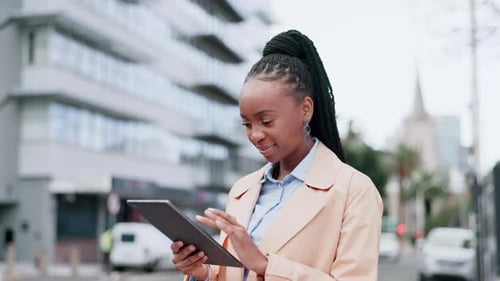 Business, black woman and tablet in city for planning information, reading news app