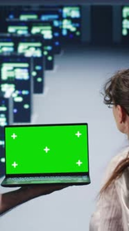 Laptop With Green Screen in Server Room