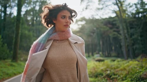 Beautiful Traveler Walking Autumn Park in Scarf Woman Strolling Wood Closeup