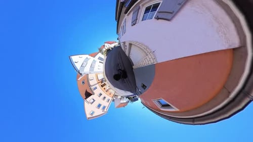 Little Tiny Planet 360 Small World View Of A Man Walking Near Medieval Buildings in Germany in 4K
