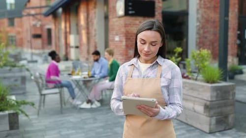 Waitress Takes Order on Tablet