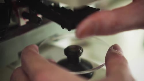 Close Up Of Using Lensmeter Measure And Marking The Power Of Prescription Lens