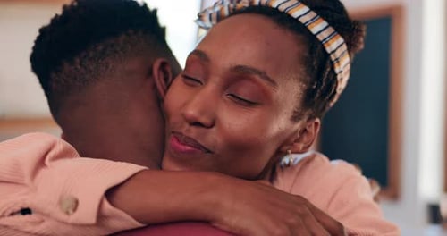 Woman Smiles While Hugging Someone