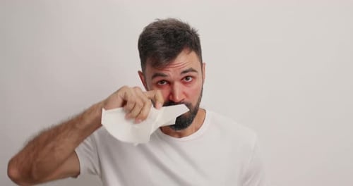Ill Man Uses Nasal Spray for Allergies