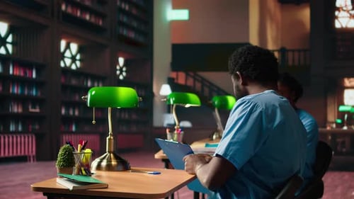 Future Nurses Studying Anatomy Class Notes in a University Library