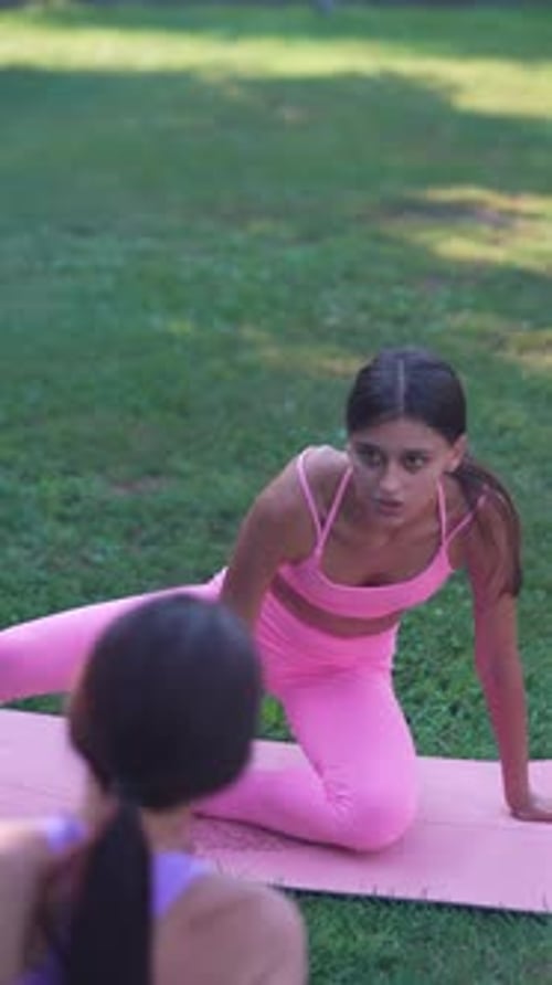 A Gathering for Group Yoga in the Park on a Summer Day