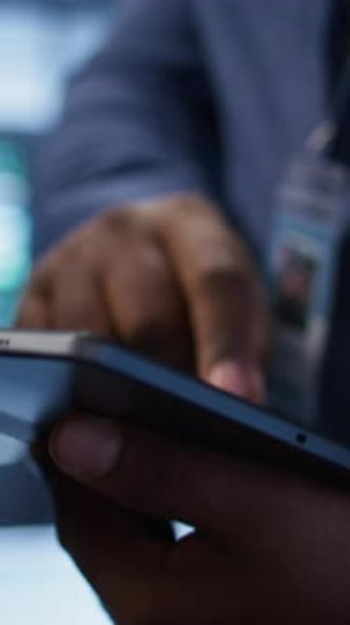Vertical Video Extreme Close Up Shot of Worker in Server Hub Using Tablet