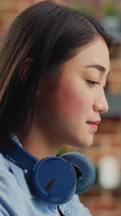 Close up of Young Adult Wearing Headphones