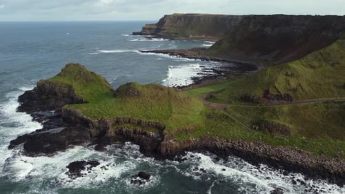Aerial view of the Giant's Causeway on a sunny day, County Antrim, Northern Ireland. Right to left r