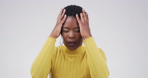 Woman Massaging Head Suffering Headache and Stress