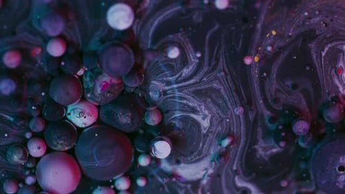 Abstract Multi-Colored Spheres Floating in Galaxy-Like Liquid