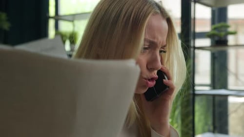 Angry Caucasian Woman Irritated Mad Female Businesswoman Talking Mobile Phone in Office Stressed