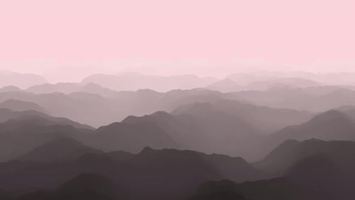 Aerial view of Majestic foggy mountains, Misty Sunrise Over Serene Mountain Range.