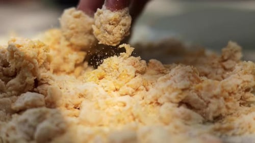 Hand Mixing Flour Dough Close Up