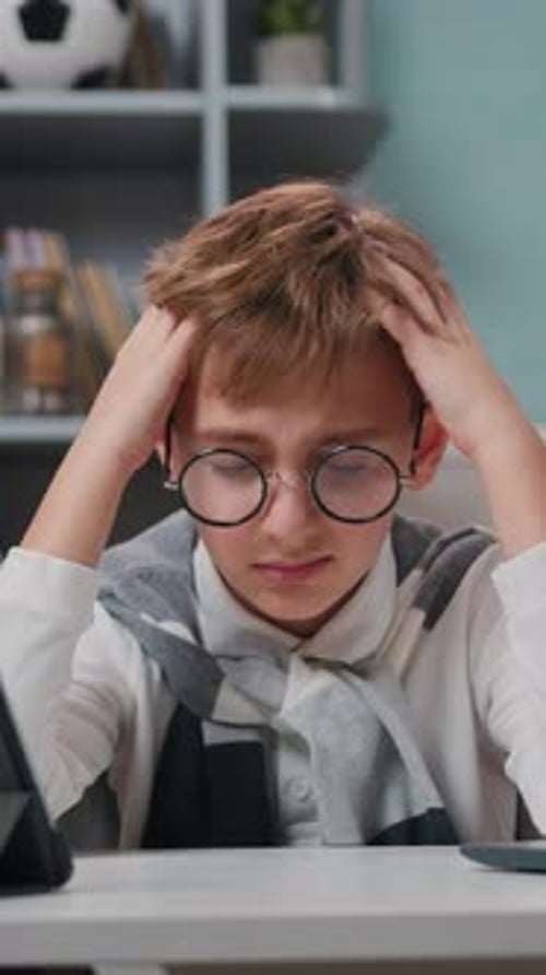 Teenage Boy Headache While Distance Learning with Laptop at Home Problem Suffering From Tension and