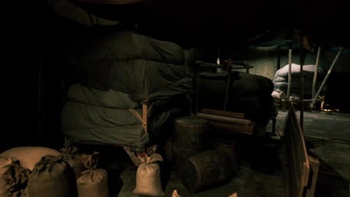 Smooth Camera Dolly Through Dark Storage Room with Merchandise