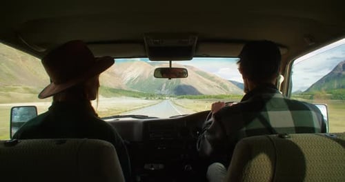 Couple Driving on a Scenic Road Enjoying Road Trip Adventure in Altai Russia