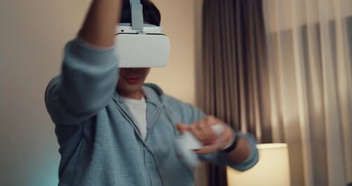 Adult Using Virtual Reality Headset in Home