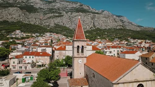 Vivid Aerial view of Coastal Town with Dense Architecture. Lively urban scene captures the essence o