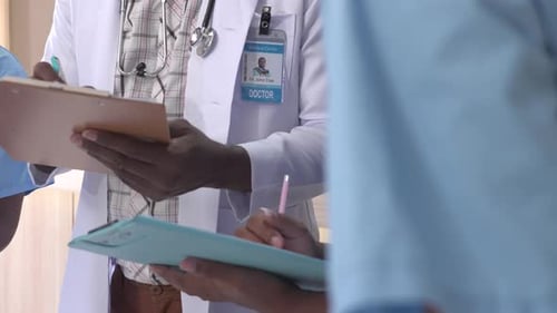 Close up of doctor write on clipboard in the ward, Healthcare professionals