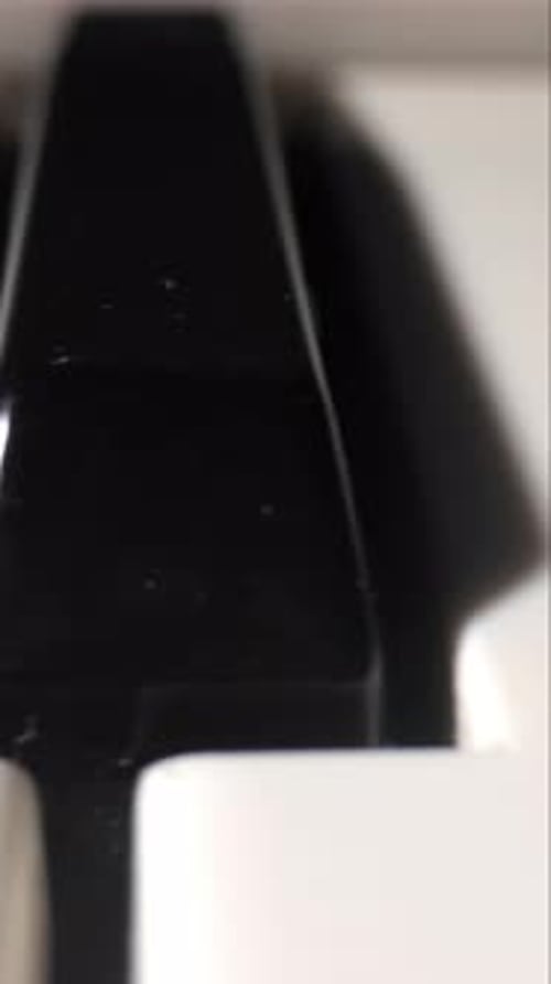 Keys on a Musical Keyboard Piano in Vertical