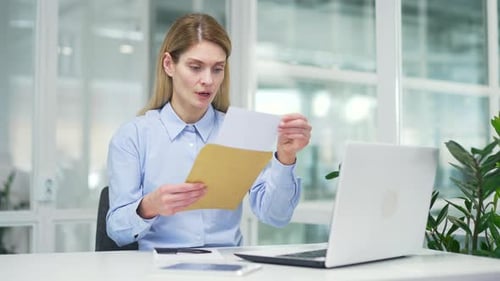 Woman Receives Bad News at the Office