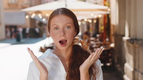 Adult Girl Looking Surprised at Camera Shocked By Sudden Win Good Victory News Wow in City Street