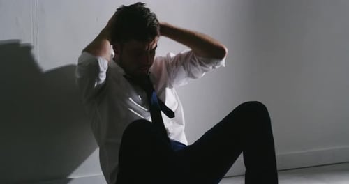 An Insane paranoid man in distress. A mentally ill person suffering from extreme anxiety