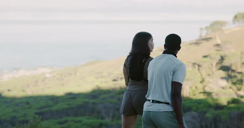 Couple, hiking and view with people on mountain for travel, adventure and break in nature