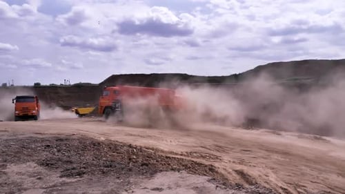 A Construction Site with Heavy Equipment Working Vigorously in Action and Progress Across the Land