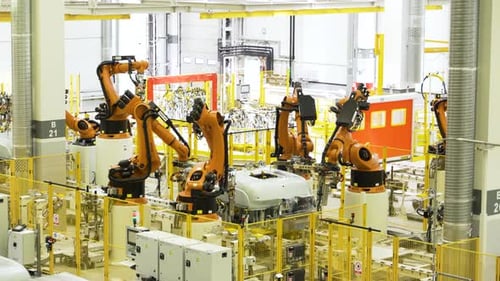 Robotic Arms Assembling Car Body in Modern Automated Factory
