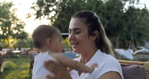 Mother and Child Having Fun in the Park