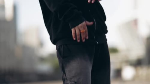 Young Woman Dancing Hip Hop on the Street