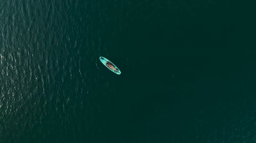 Aerial View Paddleboarding in the Serene Green Canyon