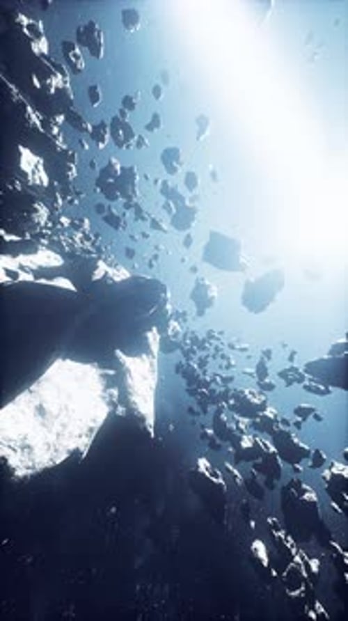 Flying Through a Dynamic Asteroid Field in Deep Space