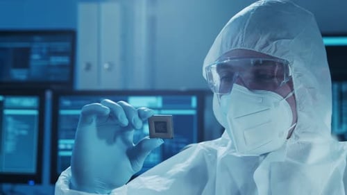 Microelectronics Engineer Works in a Modern Scientific Laboratory on Computing Systems Electronic